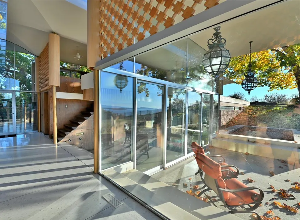 Glass walls, stair and reflecting pool