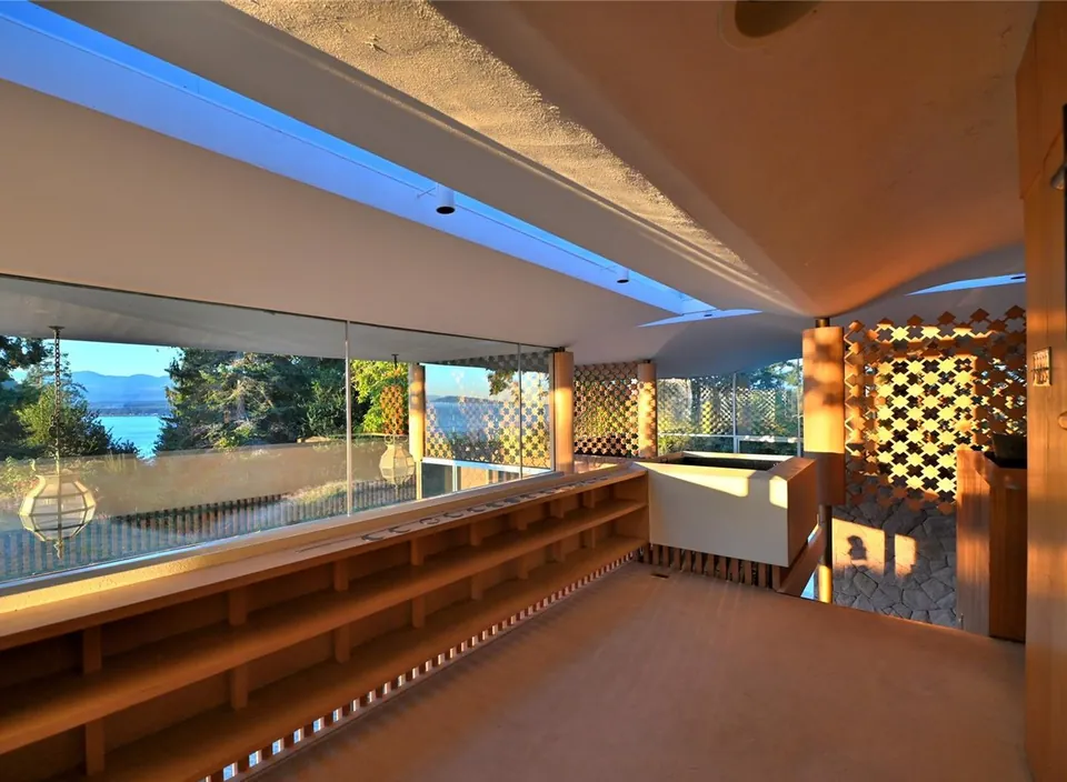 Skylit living room with a curved ceiling